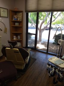 dental examination room with a large window at Dobson Ranch Family Dentistry3